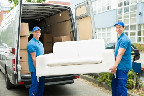 Commercial moving trucks preparing for a move in the UK