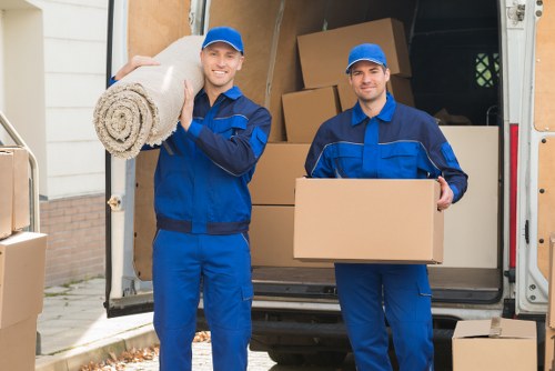 Professional movers handling boxes