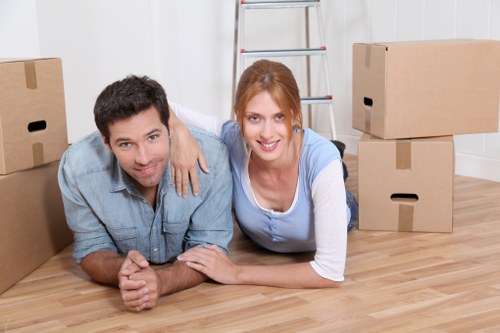 UK removalists transporting furniture in a van