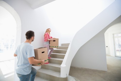 Removalist team handling fragile items with care